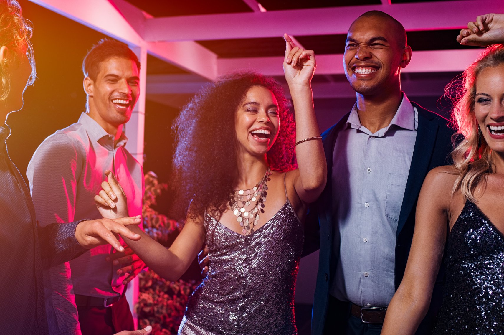 Friends dancing at party